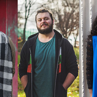 A montage of five students standing and facing the camera.