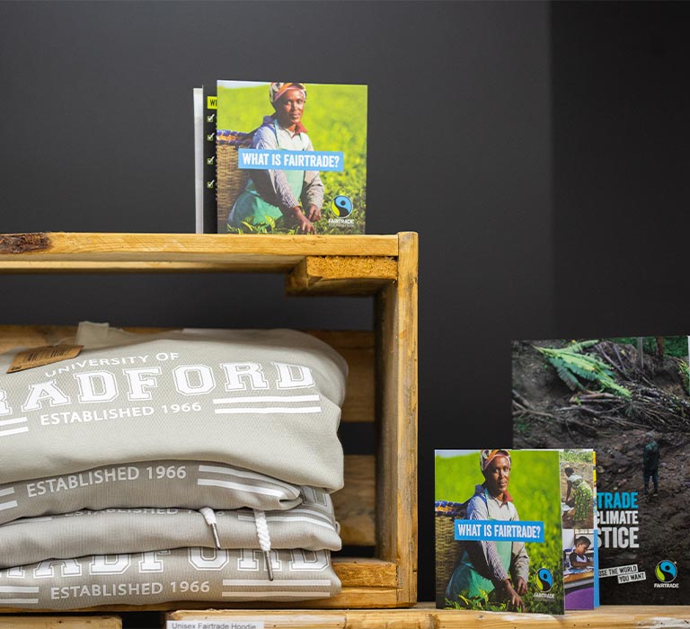 University of Bradford jumpers displayed next to Fairtrade signage.