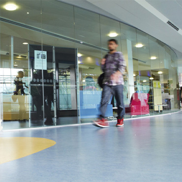 A student walking in the library.