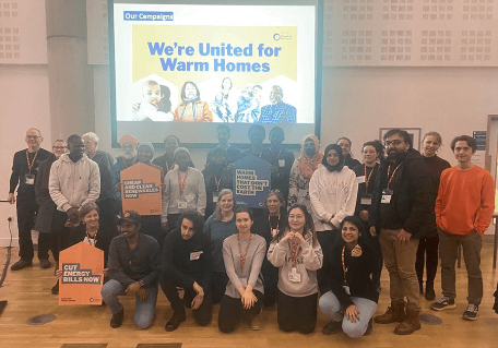 Students taking a group photo at the Friends of the Earth event