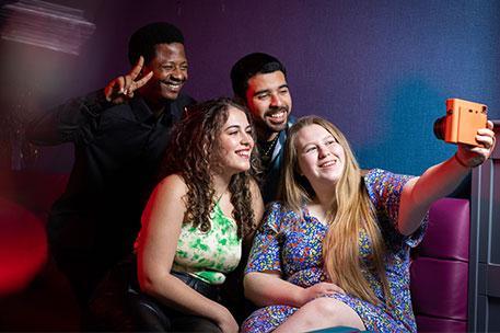 A group of students taking a selfie together.