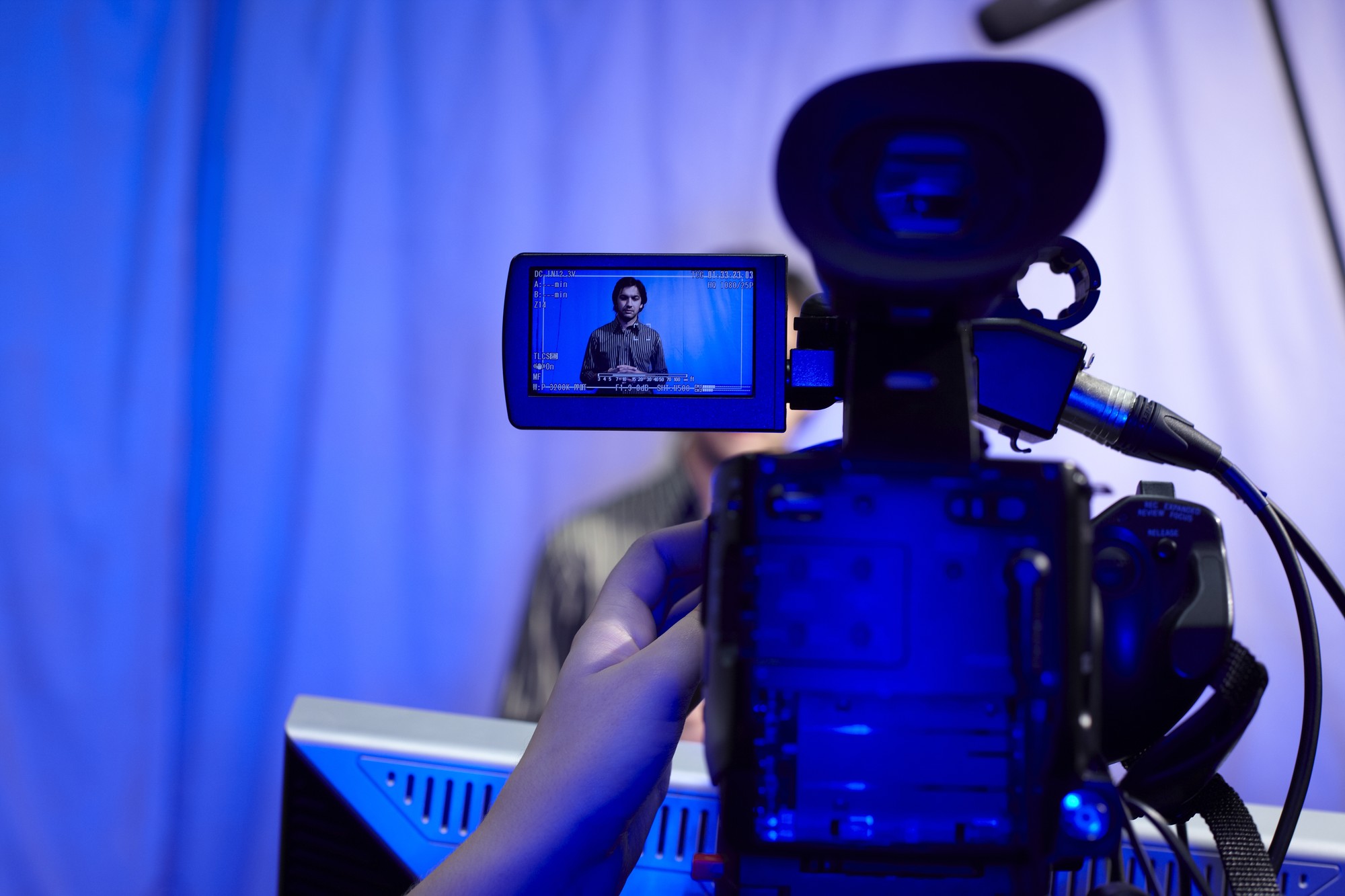 camera with preview of what's being filmed in a studio