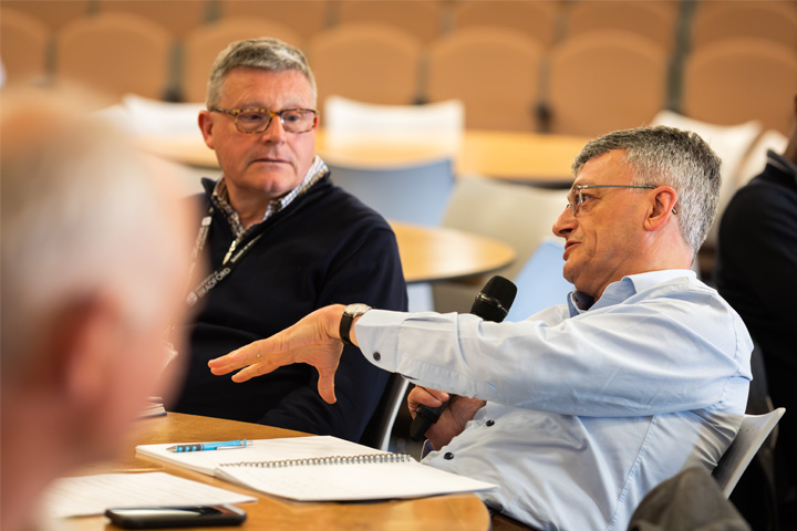 Delegates engaging in conversation at the MBA Summit 2024