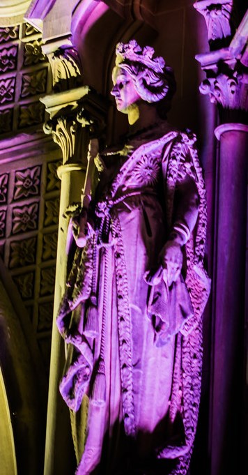 A figure craved in stone on a building exterior