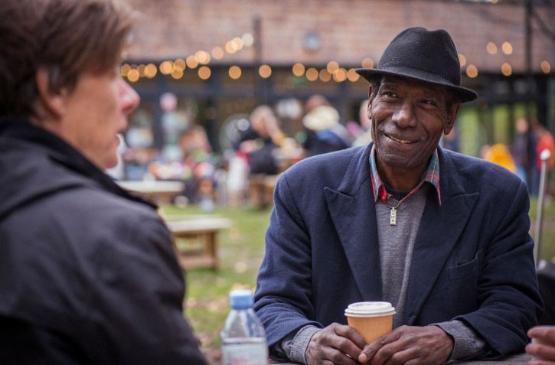 Age positive image of two people enjoying coffee