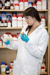 Female student looking at cosmetic products