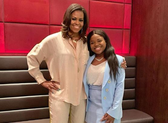 Vee Kativhu with Michelle Obama