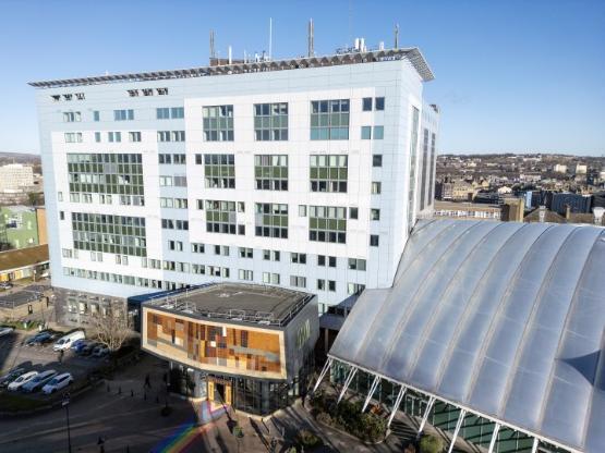 An aerial photograph taken by a drone of the main entrance of a university building