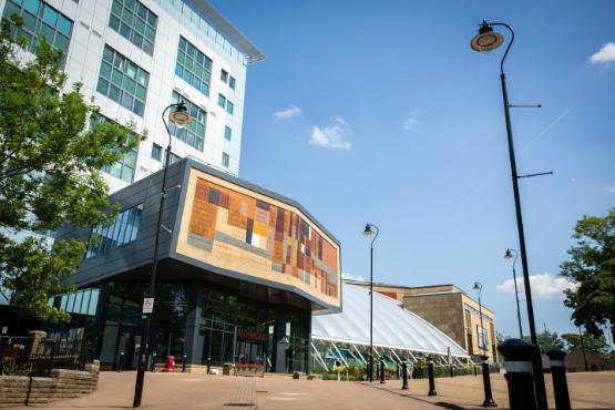 An image of the front of the main building at the university