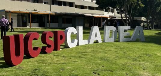 The letters USCPCLADEA on a lawn