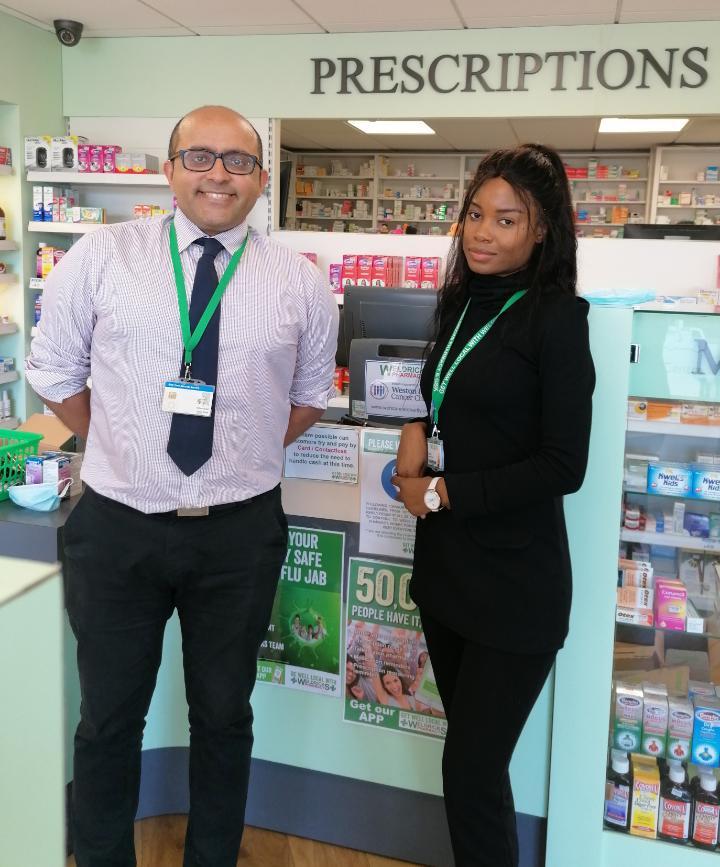 Babir Malik and graduate Gretel Billie at Weldricks pharmacy