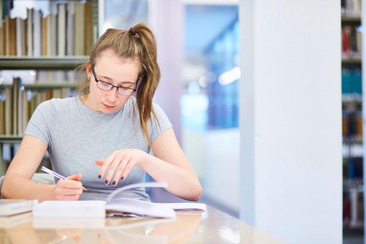 Student studying in the library