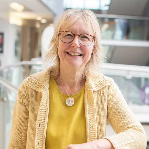 A portrait photo of Kath Bridger, Evaluation and Insight Lead